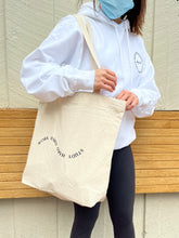 Load image into Gallery viewer, girl holding tote bag
